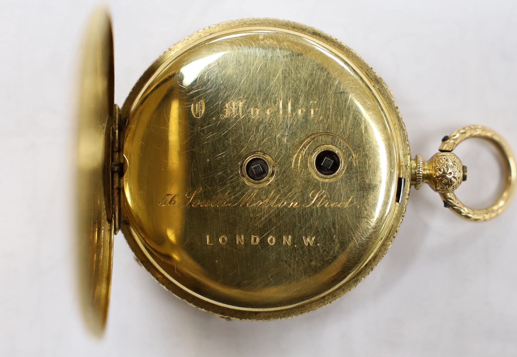 A continental engraved yellow metal open faced fob watch, with Roman dial, case diameter 38mm, gross weight 39.9 grams.